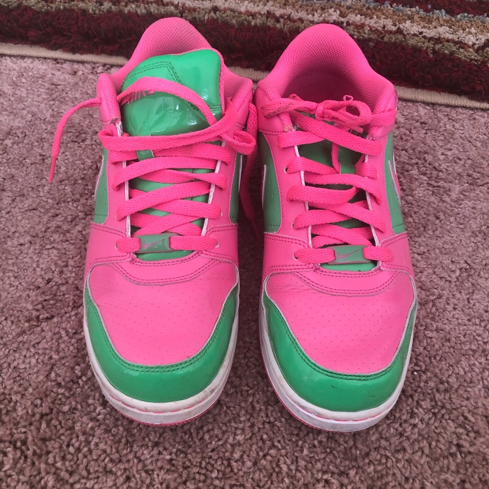 Pink and green Nike sneakers